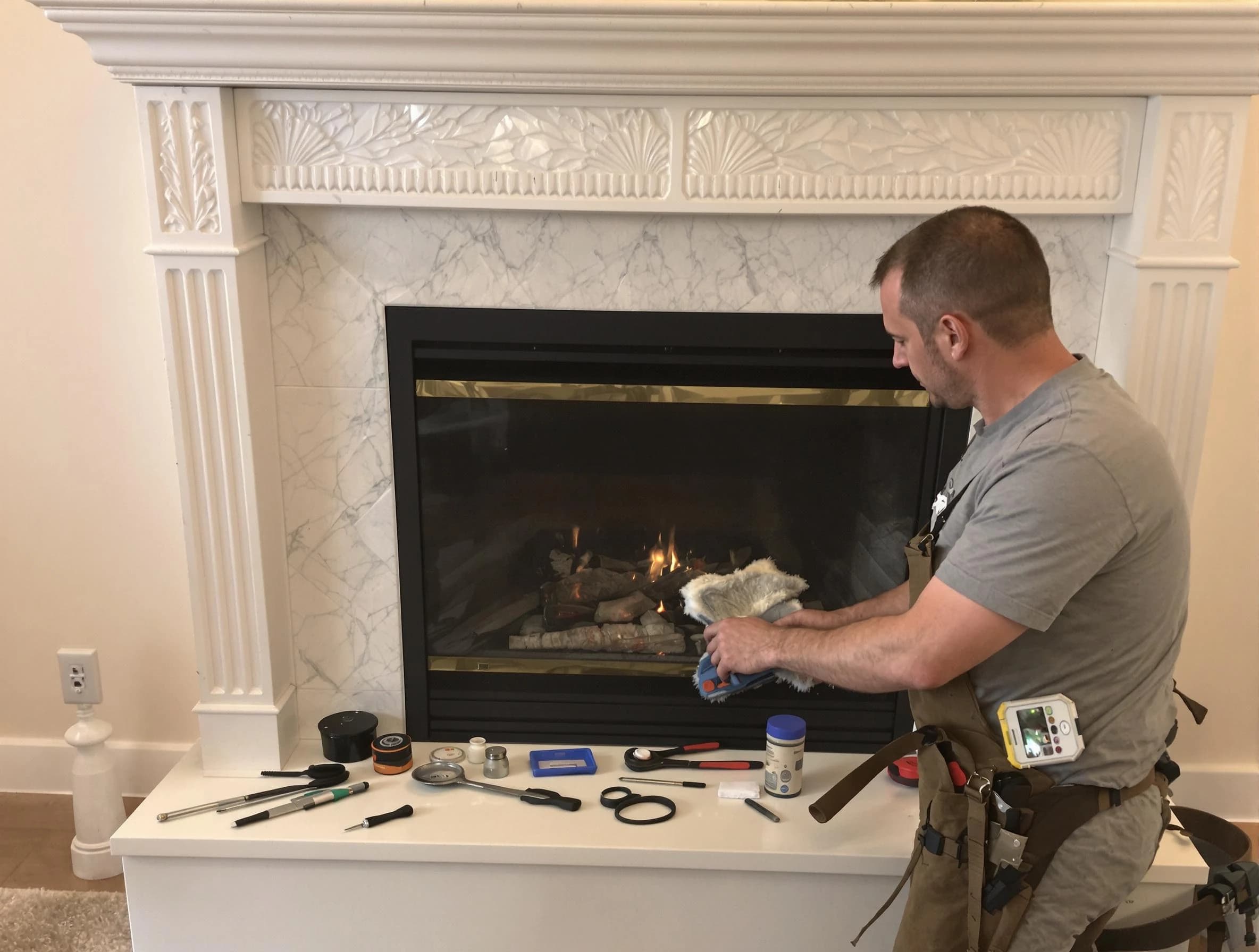 Fairfield Chimney Sweep performing fireplace maintenance in Fairfield, AL